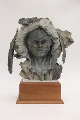Nicholas D. Moffett, Native American Figure, 1992, Bronze statue stands on a black marble base which is on a wood stand that turns to display the piece in its best