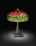 Important Tulip Lamp by Tiffany Studios, leaded glass, patinated bronze, shade stamped 'TIFFANY STUDIOS 1548', sold Dec 2018