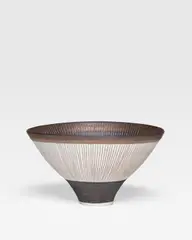 Conical Bowl by Lucie Rie, porcelain, with manganese glaze and sgraffito design, impressed 'LR', sold Dec 2018
