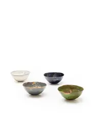 Group of four Coppetta by Fausto Melotti, blue/grey, mottled navy blue, green/gold and cream glazed stoneware, underside of each painted with seven glaze dots, sold Dec 2018