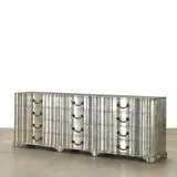 Samuel Marx, Chest of Drawers, serpentine form, silver leafed wood, bronze