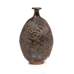 Vase by Peter Voulkos, glazed stoneware, with slip trailed floral decoration, signed on the underside, sold Apr 2018