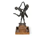 Cl.J.R Colinet, 'Country Dance' an Art Deco Patinated Bronze Study of Two Naked Female Dancers circa 1925, raised off an elaborate variegated marble tray base inset with bronze figural plaques and adorned with corner mounts