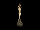 Pierre le Faguays, an Impressive Art Deco Gilded Bronze and Carved Ivory Study of a Bare-Breasted Female with Amphora