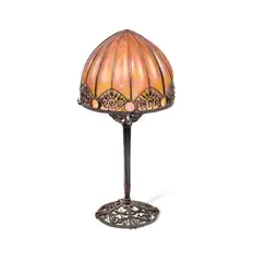Raymond Subes and Daum, An Art Deco Wrought Iron and Coloured Glass Table Lamp, circa 1925, fashioned with pierced floral panels supporting a domed glass shade internally decorated in mottled red and orange