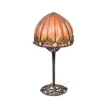 Raymond Subes and Daum, An Art Deco Wrought Iron and Coloured Glass Table Lamp, circa 1925, fashioned with pierced floral panels supporting a domed glass shade internally decorated in mottled red and orange