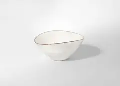 Dame Lucie Rie, A Bowl, circa 1960, stoneware, of compressed ovoid form, in oatmeal glaze with manganese rim