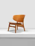 Hans J. Wegner, Shell chair, designed 1948 and manufactured by Fritz Hansen, laminated plywood, beech, remnants of the original paper label