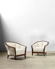 Pierre Chareau, Pair of Fauteuils, model MF172, sycamore later applied with stain, upholstery