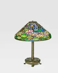 Tiffany Studios, Pond Lily Table Lamp, leaded glass, patinated bronze, shade stamped 'TIFFANY STUDIOS 1490-19'