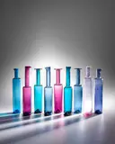 Nanny Still, Collection of Nine Koristepullo Bottles, for Riihimäen Lasi Oy, polychrome glass, each engraved RIIHIMÄEN LASI O