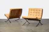 Pair of Barcelona chairs by Ludwig Mies van der Rohe, designed 1929, these examples manufactured 1972, for Knoll International, stainless steel, leather, offered Apr 2015