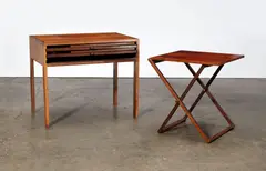 Illum Wikkelso, Suite of three folding tables, designed circa 1960 for Silkeborg, rosewood, brass, manufacturer's metal label to underside
