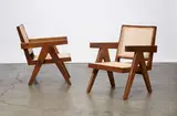 Pair of easy armchairs by Pierre Jeanneret, teak and rattan, with painted inventory number, sold Apr 2015