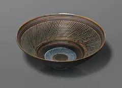 Lucie Rie, Conical bowl, circa 1965, porcelain with manganese, and blue glaze