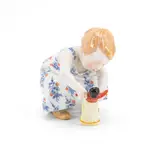 Kind mit Puppe by Meissen, Porzellan, farbig dekoriert, sold Jan 2025