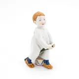 Junge auf Steckenpferd reitend by Meissen, Porzellan, farbig dekoriert, sold Jan 2025