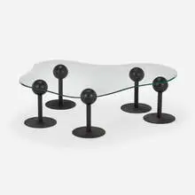 Philippe Starck, Pepper Young coffee table, c. 1980, glass, enameled steel, polyurethane foam