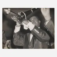 Louis Armstrong playing trumpet by Lisette Model, 1954-56, vintage gelatin silver print, sold Dec 2023