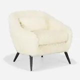 Lounge chair by Modern, c. 1955, shearling, lacquered wood, sold Feb 2023