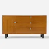Cabinet by George Nelson & Associates, 1948, walnut, lacquered wood, aluminum, sold Feb 2023