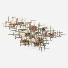 Wall sculpture by Modern, c. 1965, melt-coated brass over steel, brass, copper, sold Feb 2023