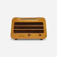 Radio, model 579 by Alexander Girard, c. 1946, walnut, plastic, steel, cloth, glass, sold Feb 2023