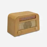 Radio, model 302 by Charles and Ray Eames, 1946, oak plywood, fabric, glass, plastic, sold Feb 2023