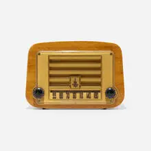 Radio, model 578A by Charles and Ray Eames, 1946, mahogany plywood, plastic, Bakelite, sold Feb 2023