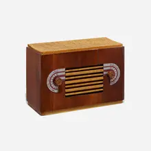 Radio by Russel Wright, 1935, bird's-eye maple, mahogany, plastic, sold Feb 2023