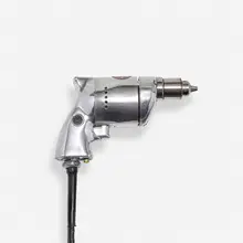 Van Dorn Electric Tool Co., Holgun drill, c. 1942, cast and polished aluminum, steel