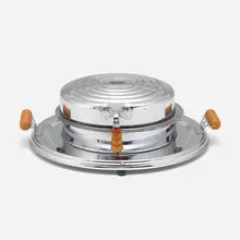 Manning Bowman & Co., Superlectric waffle iron, c. 1935, chrome-plated steel, Bakelite, glass, aluminum