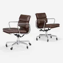 Soft Pad Management chairs, pair by Charles and Ray Eames, leather, aluminum, enameled steel, sold Feb 2023