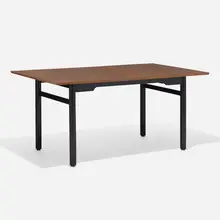 Dining table, model 673 by Edward Wormley, c. 1952, walnut, lacquered wood, sold Feb 2023