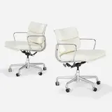 Soft Pad Management chairs, pair by Charles and Ray Eames, 1958 / 2006, leather, aluminum, sold Feb 2023