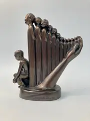 Augusta Savage, Lift Every Voice and Sing (The Harp), circa 1939, Small-scale cast white metal with bronze patina of Augusta Savage's plaster sculpture "Lift Every Voice and Sing" designed for and displayed at the 1939 New York World's Fair