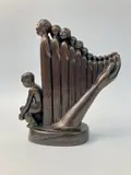 Augusta Savage, Lift Every Voice and Sing (The Harp), circa 1939, Small-scale cast white metal with bronze patina of Augusta Savage's plaster sculpture "Lift Every Voice and Sing" designed for and displayed at the 1939 New York World's Fair