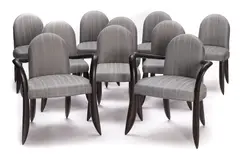two armchairs and eight side chairs by Wendell Castle, 1997, faux snakeskin textured black painted mahogany with grey fabric upholstery, offered Oct 2015