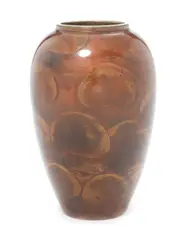 A Vase by Jean Dunand, circa 1925, of ovoid form, lacquered metal, in golden bronze tones, offered Jun 2014