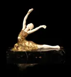 Samuel Lipchytz, An Art Deco Gilt Bronze and Carved Ivory Figure of a Tamborine Dancer, circa 1925, An Art Deco Gilt Bronze and Carved Ivory Figure of a Tamborine Dancer, circa 1925