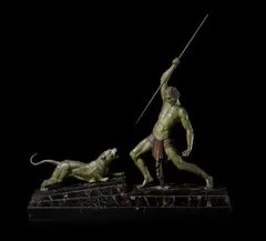 Demetre Chiparus, 'The Hunter' a Spelter Art Deco Group, circa 1925, depicting an athletic male in a loin cloth poised with spear over snarling panther, on stepped marble base