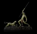 Demetre Chiparus, 'The Hunter' a Spelter Art Deco Group, circa 1925, depicting an athletic male in a loin cloth poised with spear over snarling panther, on stepped marble base