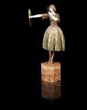 'Indiscreet' a Patinated Bronze and Carved Ivory Study by Demetre Chiparus, circa 1925, modelled as a young woman in period costume holding a parrot at arms length while instructing it to stay silent, on face, offered Jun 2014