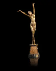 Demetre H. Chiparus, 'Egyptian Dancer' a Gilt and Cold-painted Bronze Figure, circa 1925, modelled as a dancer in Egyptian style dress, her arms out-stretched, on a marble base with Egyptian style plaque