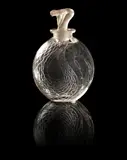 'Serpent' a Perfume Bottle and Stopper, design 1920 by René Lalique, clear glass, frosted and polished, offered Jun 2014