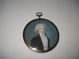 Arnoud, A Gentleman, wearing black coat with brown collar, white figured waistcoat, frilled chemise, stock and tied cravat, his hair powdered.