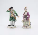 "Lesende Dame mit Muff" und "Kavalier mit Fernrohr" by Meissen, 1924-1934, einmal nach 1934, Porzellan, farbig und gold staffiert, sold May 2023