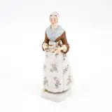 Schokoladenmädchen by Meissen, Um 1960, Porzellan, farbig dekoriert, sold Nov 2023