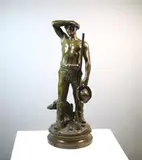 Maurice Constant Favre, Le Moissonneur (The Harvester), Early 20th century bronze with green and brown patina, signed on the base and bearing a cartouche on the front