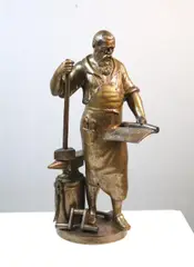Otto Rasmussen, Blacksmith on the Anvil, Patinated bronze statue. - Height: 8.5 inches